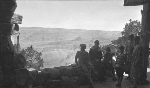 A family group posing at an overlook at the Grand Canyon. They include, from left, Herbert E. Brumder; Gertrude Merker (Mrs. Clifford F.) Messinger; unidentified; Philip G. Brumder; unidentified; Margaret Bouer (Mrs. Herbert P.) Brumder.