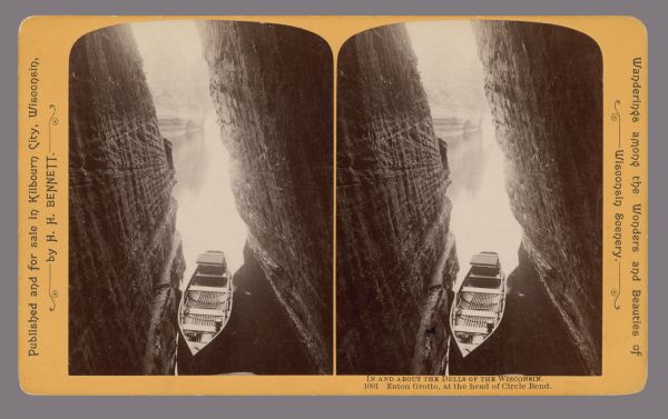 Eaton Grotto, near Narrows. View through grotto walls of rowboat and river beyond. Text at right: "Wanderings Among the Wonders and Beauties of Wisconsin Scenery."