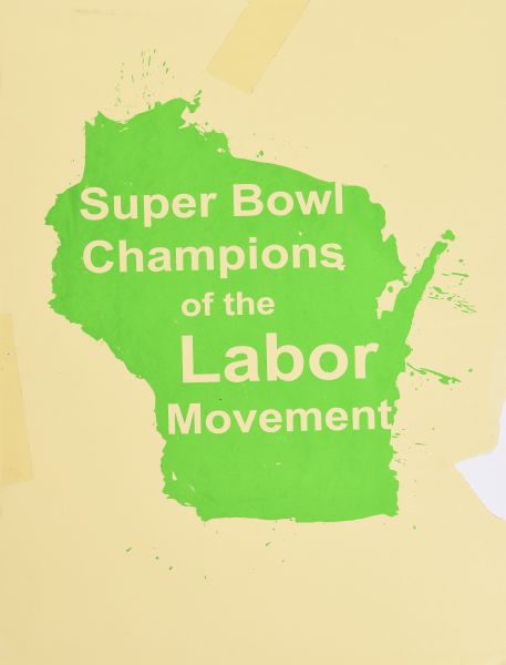 Illustration of the shape of the state of Wisconsin in green ink on yellow paper.