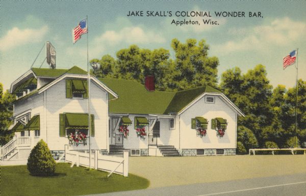 Exterior view of the Colonial Wonder Bar. Caption reads: "Jake Skall's Colonial Wonder Bar, Appleton, Wis." Text on back reads: "The New Skyline Dining Room. South Memorial Drive. The Valley's Smartest, The Best of Foods, Service in a Homelike Place to eat. — Air Conditioned."