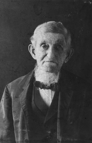 Portrait. Caption reads: "George Gillette. Born in London, England in 1811, died Swaledale, Iowa in December 1908. Farmed at Springfield Corners, Wisconsin (Dane County). Eva Gillette's grandfather.