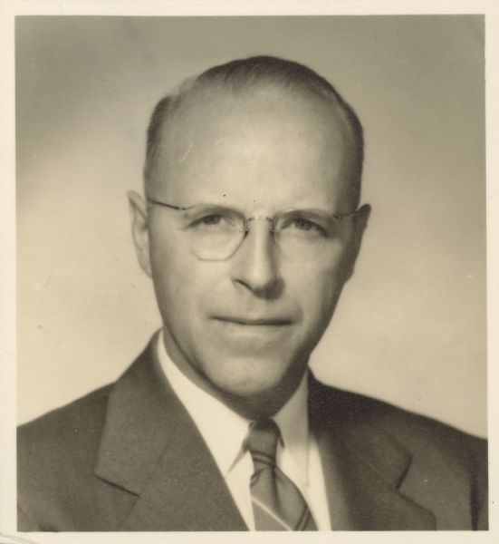 Quarter-length portrait of Dale Charles Aebischer, chief of agricultural education for the State Board of Vocational and Adult Education.