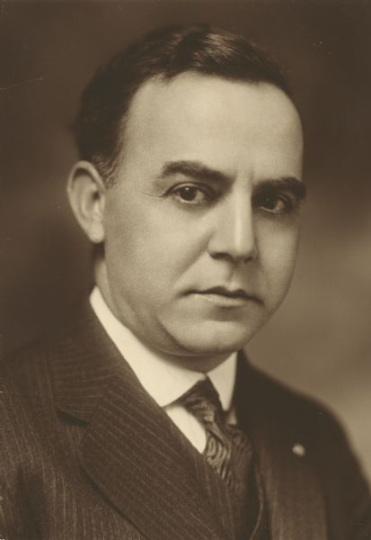 Quarter-length portrait of Charles Lehman Aarons, a lawyer and Milwaukee County Circuit Court judge, from 1925 to 1950.