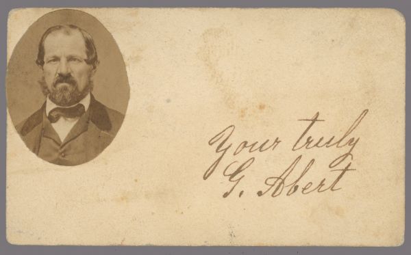 Oval-framed quarter-length portrait on a card for George Ackerman Abert, a Democratic politician active in the State Senate (1877-1878), Milwaukee city commissioner of public works (1879), and State Assembly member (1882-1883, 1893-1894). Card includes statement: "Your [sic] truly G. Abert." 