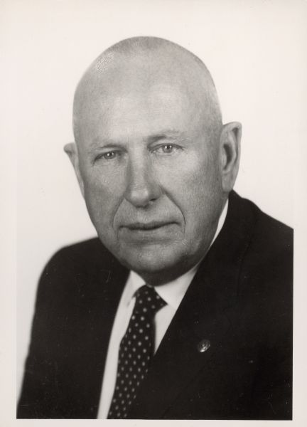 Quarter-length portrait of Harvey R. Abraham, a World War I veteran and Republican Member of the Wisconsin State Assembly from the Winnebago County district, 1947–1960.