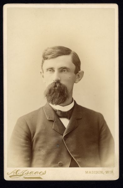 Waist-up carte-de-visite portrait of Henry Cullen Adams, a Republican member of the Wisconsin State Assembly from the Dane 3rd district (1883-1887) and member of the U.S. House of Representatives from Wisconsin's 2nd district (1903-1906). He was an advocate for the Federal Meat Inspection Act and the Pure Food and Drug Act.