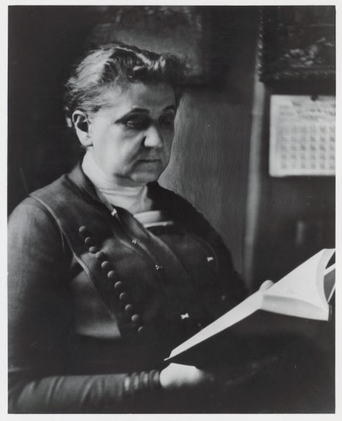 Portrait of Jane Addams, reading a book. Addams was a social worker, political activist, and author. She was a co-founder of Chicago's Hull House, as well as the American Civil Liberties Union. She was the first woman to win the Nobel Peace Prize.