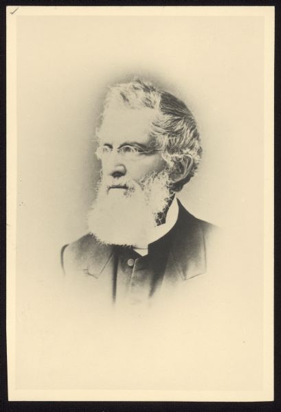 Vignetted semi-profile carte-de-visite portrait of  William Adams, a theologian, educator, and co-founder of Nashotah House, an Anglican seminary.