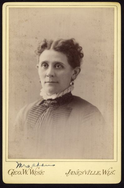Vignetted carte-de-visite portrait of a woman identified as "Mrs. Adams."