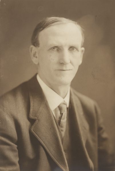 Waist-up portrait of William W. Albers, a Democratic politician and businessman. He managed pharmacies in Wausau, served on the Wausau Common Council, the Marathon County Board of Supervisors, and the Wausau School Board. He was also a Democratic State Senator from 1911-1919.