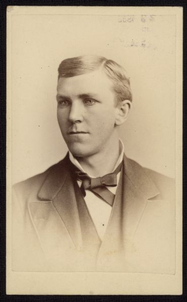 Quarter-length carte-de-visite portrait of William W. Albers, a Democratic politician and businessman. This image is from the time he was a student at the Chicago College of Pharmacy, from which he graduated in 1884.