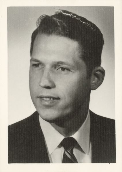 Head and shoulders portrait of Dr. James H. Albertson, president of UW-Stevens Point from 1962 to 1967. In 1967, he and seven other educators died in a plane crash in Vietnam while studying South Vietnam's higher education system.