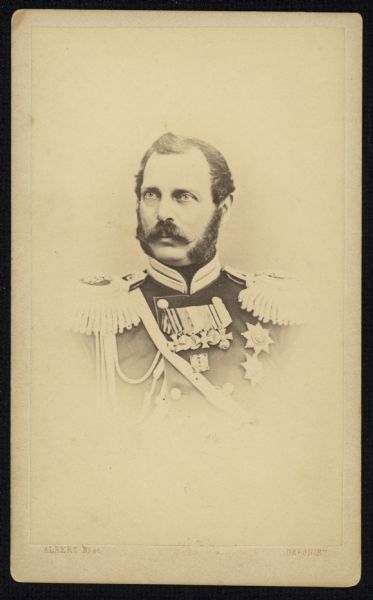 Vignetted quarter-length carte-de-visite portrait of Nicolaevitch Alexander, who ruled as Emperor of Russia from 1855 until his assassination in 1881. Alexander II emancipated Russian serfs in 1861, sold Alaska to the United States in 1867, and fostered the League of the Three Emperors alliance with Germany and Austria.
