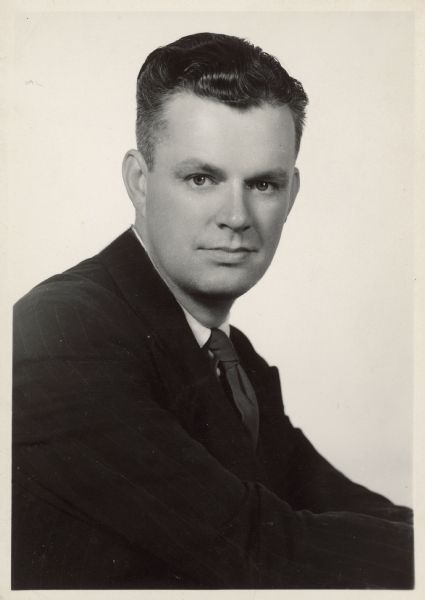 Waist-up portrait of Edward Alexander, director of the Wisconsin Historical Society, 1941-1946.