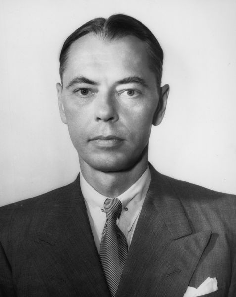 Quarter-length portrait of Archibald S. Alexander, United States Under Secretary of the Army (1950-1952) and Treasurer of New Jersey (1954-1957).
