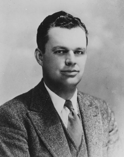 Quarter-length portrait of Edward Alexander, director of the Wisconsin Historical Society, 1941-1946.