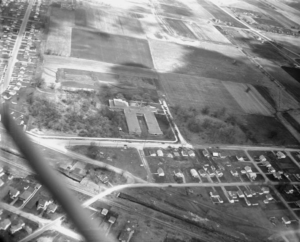 Aerial view of the construction of Herbert Schenk Elementary School, as well as the surrounding neighborhood.