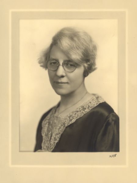 Quarter-length portrait of Dr. Cora S. Allen, physician and director of the Bureau of Child Welfare in Wisconsin.
