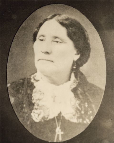 Oval-framed quarter-length portrait of Marie De Marie Allen, wife of Chippewa Falls founder Hiram S. Allen.