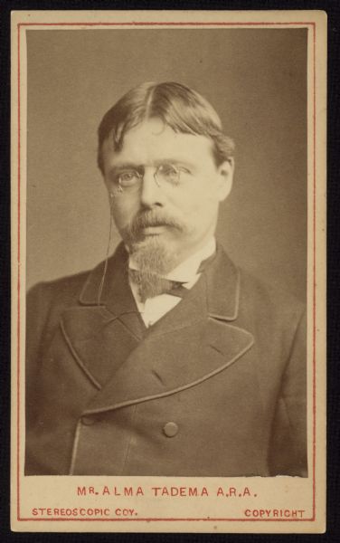 Waist-up carte-de-visite portrait of Lawrence [Lourens] Alma-Tadema, a Dutch-born, British painter known for depictions of Roman life painted in the Academicist style. He is wearing a pince-nez.