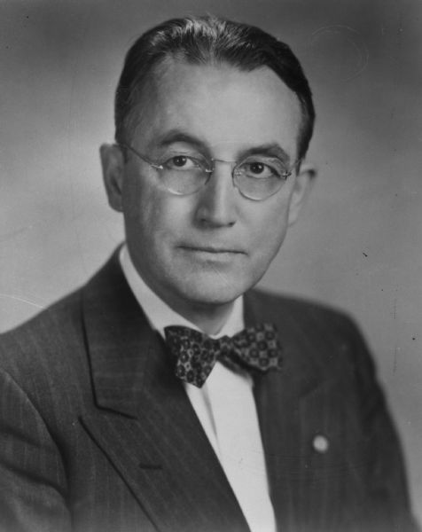 Portrait of Arthur J. Altmeyer, a key figure in the creation of the United States Social Security system. Altmeyer was a student of John R. Commons at UW-Madison, where he studied social and labor policies. He was Secretary of the Wisconsin Industrial Commission (1922-1933), where he worked on the state's unemployment insurance program. He was chosen by President Franklin D. Roosevelt to work on what became the Social Security Act of 1935. From 1936-1946 he worked for the Social Security Board, as its chair for all years except 1936. From 1946-1953 he was Commissioner of the Social Security Administration.