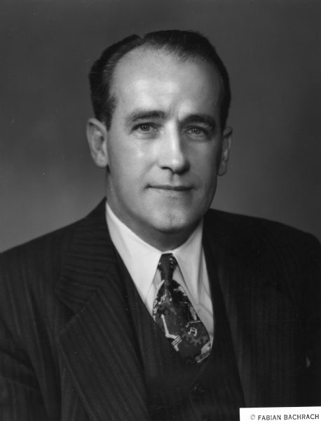 Quarter-lenth portrait of William Pollock, a long-standing union official. Pollock was business agent for United Textile Workers (UTW) Local 25 from 1931-1937, when he became manager of the Textile Joint Board, following UTW's merger with the Congress of Industrial Organizations (CIO). When the textile unions combined to form the Textile Workers Union of American (TWUA) in 1939, he became the new union's general secretary-treasurer. He kept that role until 1953, when he became executive vice president. When Emil Rieve stepped down as president in 1956, Pollock was elected president. He was reelected to that post until 1972.