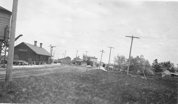 Railroad depot taken as part of a survey by the Wisconsin Power and Light Company to promote economic development by emphasizing available buildings and building sites.