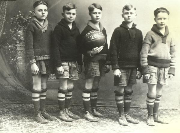 Don Ameche poses with his junior basketball team at Franklin School. He was ten-years-old and captain of the team.