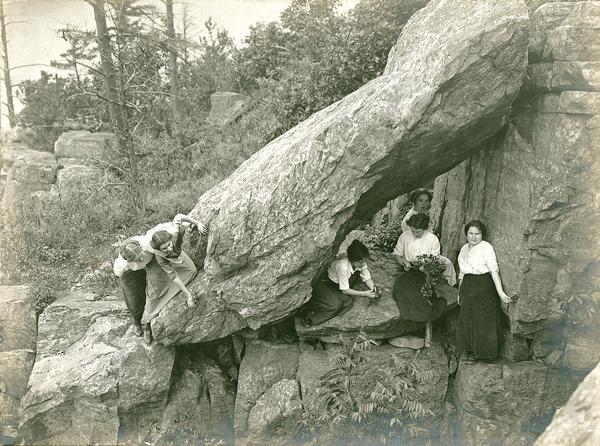 Six young women posed among the rocks at Devil's Lake.