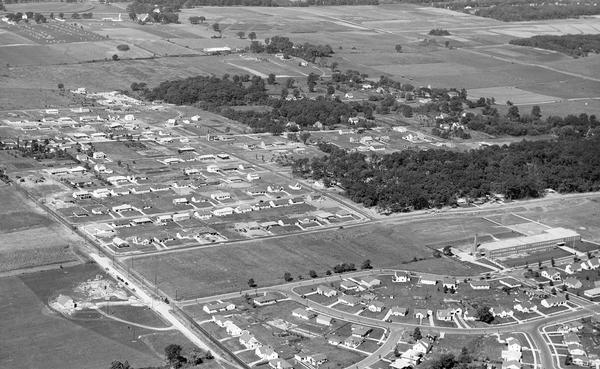 Aerial view of the Midvale neighborhood under construction showing the intersection of Midvale and Tokay Boulevards near the southwestern city limits of Madison.