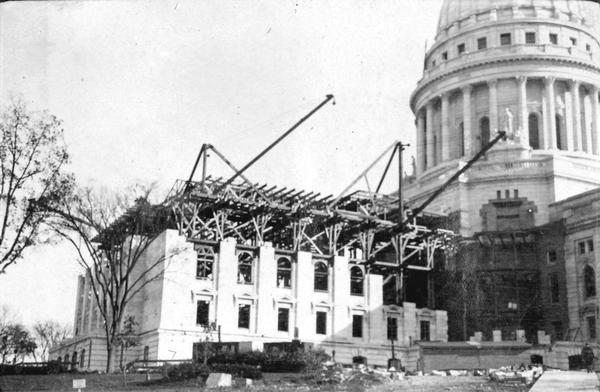 Construction of the north wing of the Wisconsin State Capitol building.