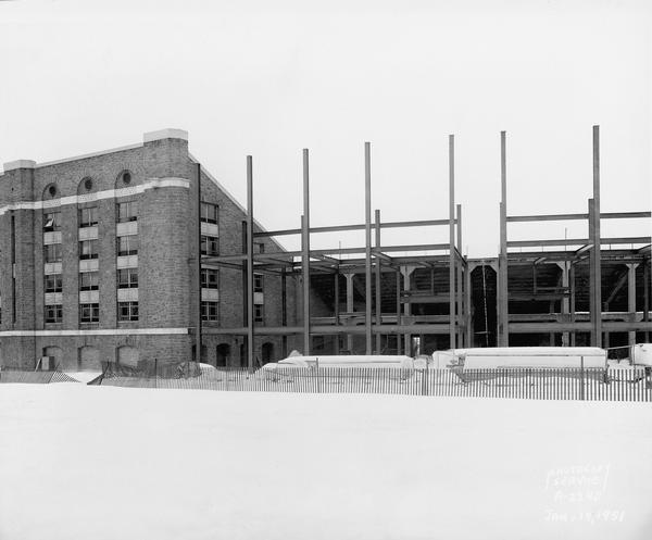 North addition to University of Wisconsin-Madison Camp Randall Stadium, with steel framework connecting to the old structure on the east side.