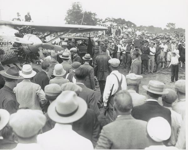 Crowd greeting the "Spirit of St. Louis" when Charles Lindbergh flew to Madison on August 22, 1927. The crowd at Pennco Field (Royal Airport)was so large that Lindbergh himself cannot be seen here. The size of the Madison crowd is representative of the public adulation Lindbergh received after his trans-Atlantic flight. Madison was particularly excited because Lindbergh had been a student at the University of Wisconsin.