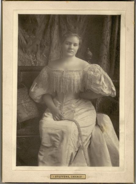 Studio portrait of Violet Dousman in an evening dress.  Oldest daughter of Louis and Nina Dousman.  Born December 7, 1874; died January 14, 1940.