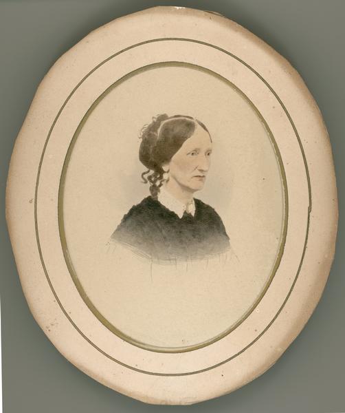 Head and shoulders portrait, possibly of Jane Fisher Rolette Dousman, wife of Hercules Dousman and mother of H. Louis Dousman.  The photograph has been enhanced by watercolor.