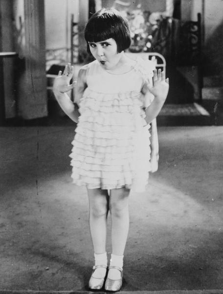 Baby Rose Marie in a ruffled dress in her trademark pose from the Vitaphone short <i>Baby Rose Marie</i>.
