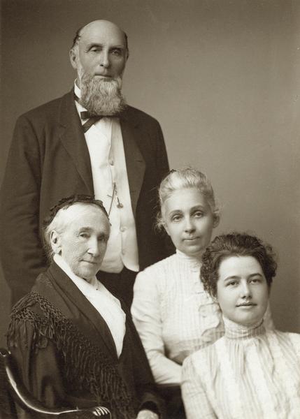 Captain Isaac H. Moulton of La Crosse, Wisconsin, with his mother, wife Hannah, and one of his daughters. Moulton was captain of the "City of St. Paul," the "Phil Sheridan," and other river steamers on the Mississippi River.