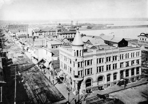 Elevated view looking west from the Knight Block. The Chequamegon Hotel and harbor are in the background.