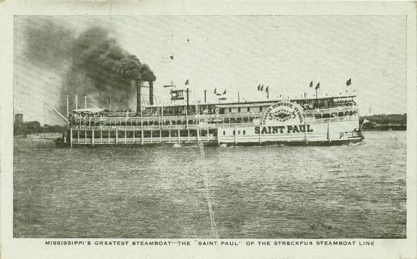 The <i>Saint Paul</i>, underway on the Mississippi river. Sign on wheel reads St. Louis, Dubuque, St. Paul, Streckfus Steamers. Later named the <i>Senator</i>.