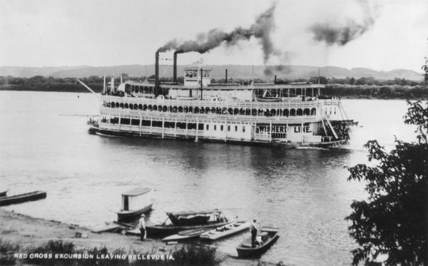 Elevated view of the sternwheel excursion, "G.W. Hill," leaving Bellevue with a Red Cross Excursion. Later named "Island Maid."