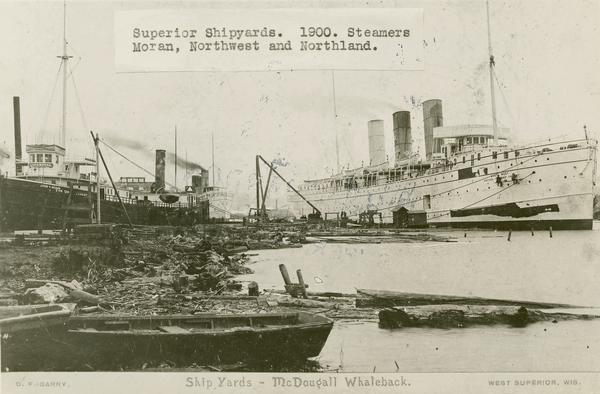 The Superior Shipyards showing steamers "Moran", "Northwest" and "Northland. Caption reads: "Ship Yards — McDougall Whaleback. West Superior, Wis."