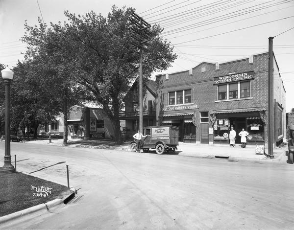 Storefronts of the Wisconsin School of Music, East Side Variety Store and Hess Grocery Market. Owned by the Hess family, this property was located at 154 Atwood Avenue (address changed, in 1929, to 1962-1964 Atwood Avenue).