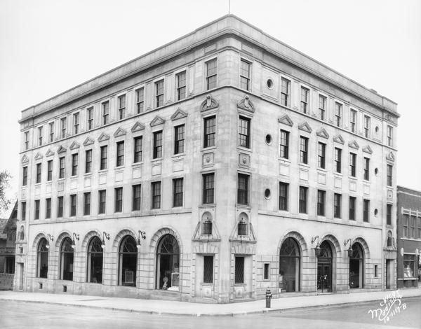The Madison Gas and Electric (MG&E) office building on the corner of North Fairchild and West Mifflin Streets. The Bedford limestone building was designed by Frank Riley in 1922.