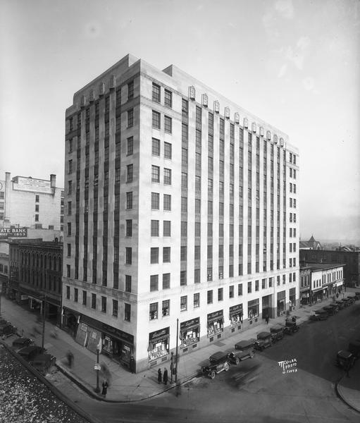 Elevated view of the Tenney Building, located on the corner of East Main and South Pinckney Streets. The building was designed in 1929 by Law, Law, and Potter.