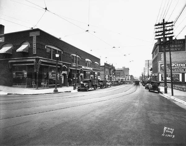 East Wilson Street, looking east from the King and Butler Streets intersection, with Rubin's Furniture at 302 East Wilson Street, Fitzgerald Electric at 306 East Wilson Street, and Madison Tent and Awning at 313 East Wilson Street.