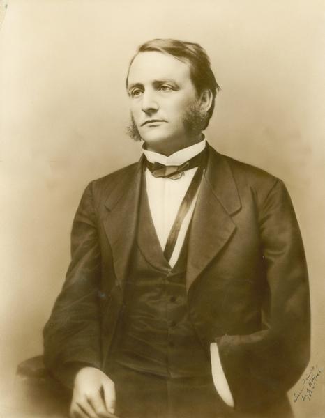 Waist-up portrait of Lucius Fairchild during his tenure as Secretary of State of Wisconsin. Fairchild's arm was amputated after he was injured at the Battle of Gettysburg on July 1, 1863. In 1866 he was elected governor.