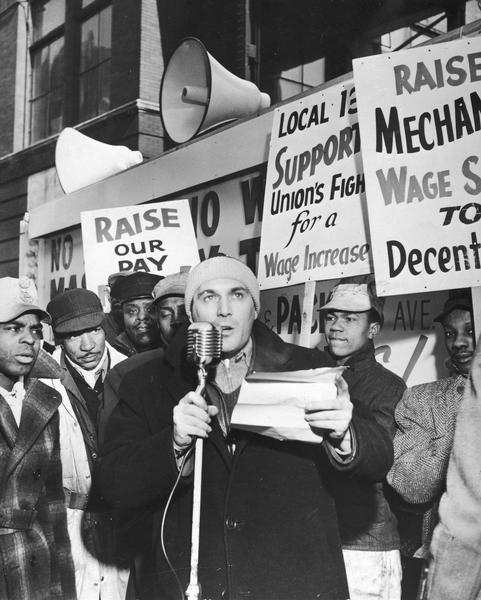 Herbert March speaking at the "Negro and White, Unite and Fight" rally in -8 F degree weather.