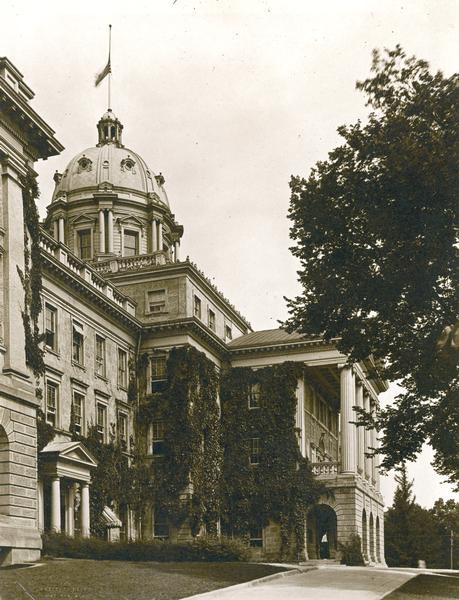 A view of Bascom Hall with dome (formerly Main Hall) on the University of Wisconsin-Madison campus looking north past the front portico. The view includes the dome later destroyed by fire.