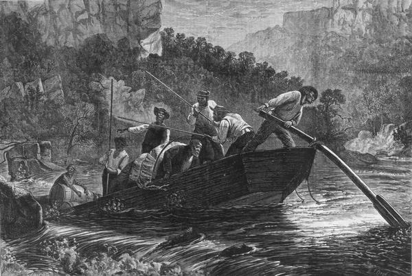 African American boatmen run a rapids in a small river boat.