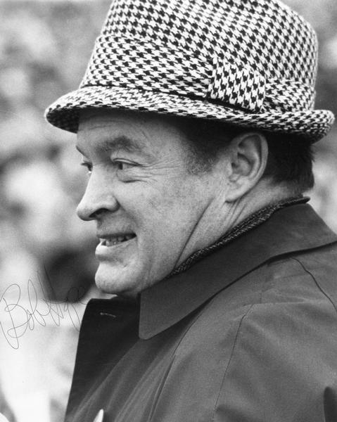 Bob Hope at University of Wisconsin-Madison Homecoming football game against his alma mater Ohio State.  The photograph is autographed by Hope.